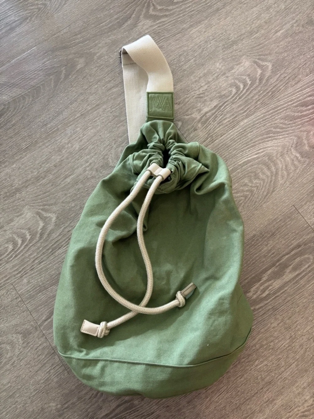 JWA Uniqlo Green Drawstring Sling Backpack with Beige Strap